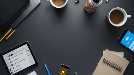 Modern workspace digital devices tablet laptop smartphone note taking apps